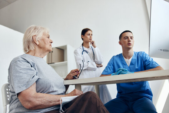 elderly woman at the doctor's and nurse's appointments health care