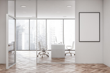 Bright office interior with white poster, panoramic window, desktop