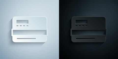 Obraz premium Paper cut Credit card icon isolated on grey and black background. Online payment. Cash withdrawal. Financial operations. Shopping sign. Paper art style. Vector