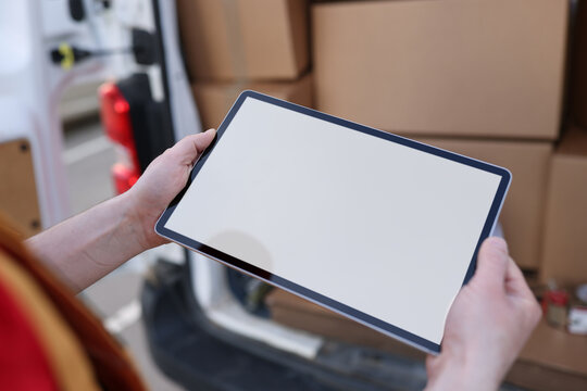 Courier hands hold tablet with blank screen, mocap - Powered by Adobe