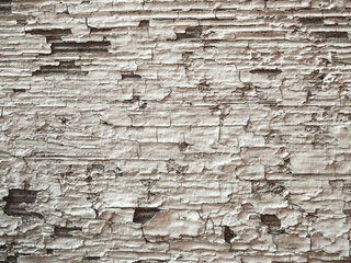 Old wood panel with cracked white paint. Cracked paint texture.