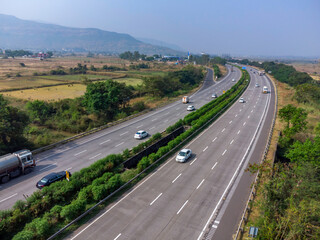 Aerial footage of the Mumbai-Pune Expressway near Pune India. The Expressway is officially called...