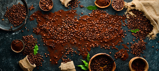 Coffee beans. On a wooden background. Top view. Copy space