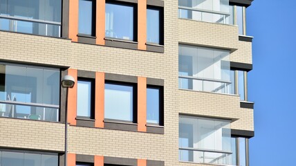 Fototapeta Modern apartment building in sunny day. Exterior, residential house facade. obraz