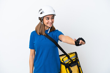 Young caucasian woman with thermal backpack isolated on white background giving a thumbs up gesture