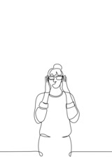 woman with beam on her head puts on glasses on herself- one line drawing vector. concept of trying on new glasses, losing sight and starting to wear glasses, computer glasses for work