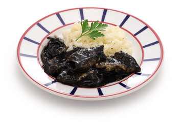 chipirones en su tinta, small squid cooked in black ink, spanish basque cuisine