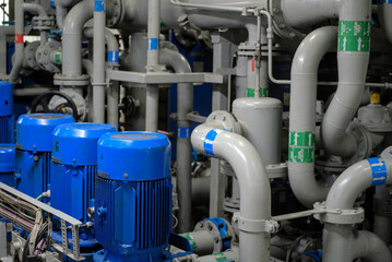 Industrial Piping and valves. Modern Ship interior - Pipe and valve system located inside engine room of a modern ship