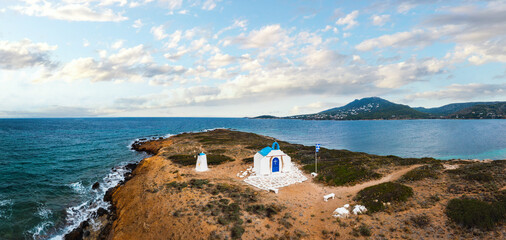 Scenic orthodox chapel in Vravrona, Attica Rivera region, Greece. Idyllic beautiful religious building on a small greek island.