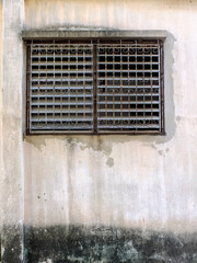 old windows with curved steel on the wall