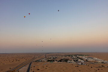 Tourists take the balloon ride over the Arabian desert in the Emirate of Dubai. 