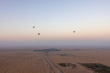 Tourists take the balloon ride over the Arabian desert in the Emirate of Dubai. 