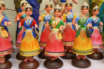 A Collection of charming Dancing girl Dolls made from clay and hand painted with vibrant bright colors in India.

