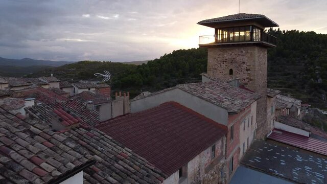 Drone flight view over Old Tower Jail in Fuentespalda village in Matarra&ntilde;aa region in Spain. 
