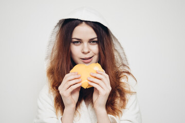 cheerful woman eating sandwich snack fast food