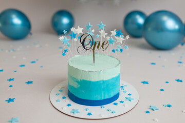 First Birthday blue cake with white grey balloons and stars 