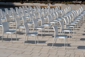 chairs lined up side by side in the event area