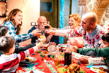 Large happy family having fun at christmas supper party - New years eve and winter holiday concept...