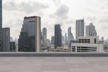 Panoramic Bangkok skyline view, concrete observatory deck on rooftop, daytime. Luxury Asian corporate and residential lifestyle. Financial city downtown, real estate. Product display mockup empty roof