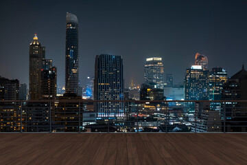Panoramic Bangkok skyline view, wooden observatory deck on rooftop, night time. Asian corporate and residential lifestyle. Financial city downtown, real estate. Product display mockup empty roof