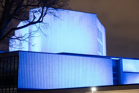 Helsinki / Finland - APRIL 20, 2019: The Helsinki City municipal theatre, illuminated during nighttime, was closed during the Covid-19 pandemic lockdown.
