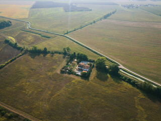 Farm house in the Italy. Aerial photo rural scene in farmland.
