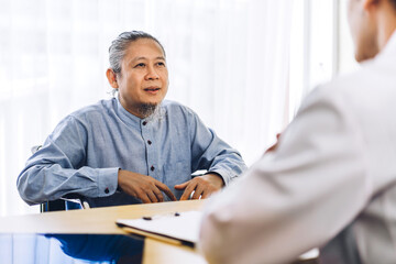 Asian man doctor service help support discussing and consulting talk to asian senior man patient at meeting health medical care express trust concept in hospital.healthcare and medicine
