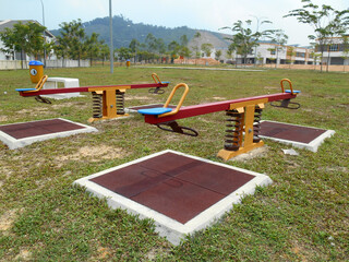 Obraz na płótnie Canvas MALACCA, MALAYSIA -MAY 02, 2016: Children's outdoor playground in the public park. It was designed with a few different themes and colors to give a different experience to the kids. 