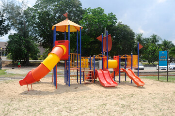 MALACCA, MALAYSIA -MAY 02, 2016: Children's outdoor playground in the public park. It was designed with a few different themes and colors to give a different experience to the kids. 