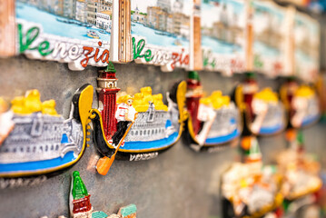 Fototapeta na wymiar Creative gondola and various venice landmark souvenirs displayed for sale to tourisgts
