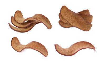 Set with delicious crispy rusks on white background
