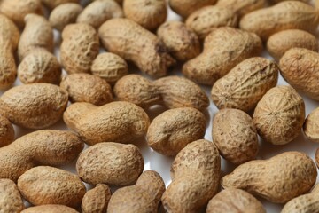 peanut in a shell texture. food background of peanuts. Top view.