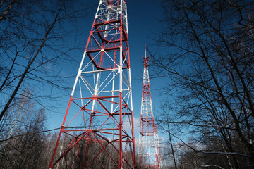 communication towers in the forest