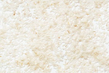 Polished long-grain rice on a white background.