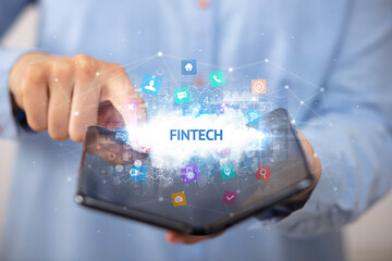 Businessman holding a foldable smartphone, technology concept