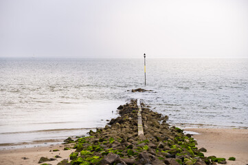 Groyne with shoals signs on the North Sea island of Föhr