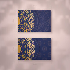 Business card in dark blue with abstract gold pattern for your brand.