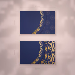 Business card in dark blue with antique gold ornaments for your contacts.