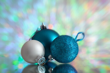 Blue Christmas balls on the abstract background. New Year, Christmas background with Place for text, Copy space for inscription.