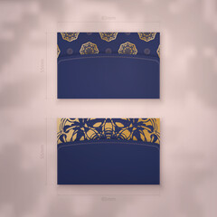 Business card in dark blue with greek gold pattern for your business.