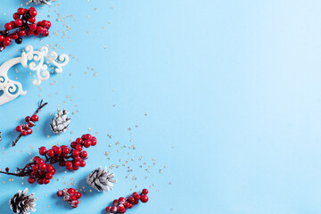 Christmas and happy new year card border with red berries branch