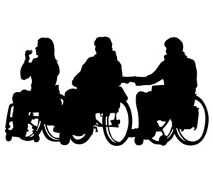 Disabled people in wheelchairs are driving down the street. Isolated silhouettes on white background