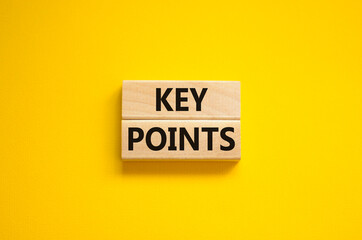 Time to key points symbol. Concept words Key points on wooden blocks on a beautiful yellow background. Business and time to key points concept. Copy space.