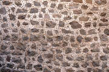 Stone wall in the old city of Avila, Spain.