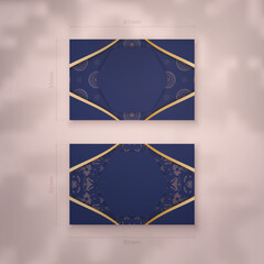Business card template in dark blue with Greek gold ornaments for your contacts.