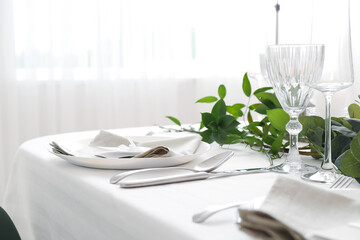 Beautiful table setting for wedding celebration in restaurant