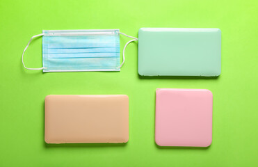 Medical mask with cases on green background