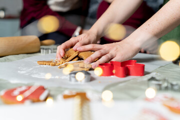 Woman Making Ginger Cookies On Christmas close up. Prepare dessert for Christmas