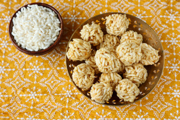 Murmura ladoo laddu puffed rice ball 
pori urundai Indian festival food snack sweet for Lohri Makar Sankranti Pongal Diwali harvest festival Tamil Nadu winter folk festival Punjab North India. 