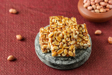 Peanut chikki peanut candy groundnut sweet Kappalndi Kadalai mittai Indian festival food snack Lohri Makar Sankranti Pongal Diwali harvest festival Tamil Nadu winter food festival Punjab North India.
